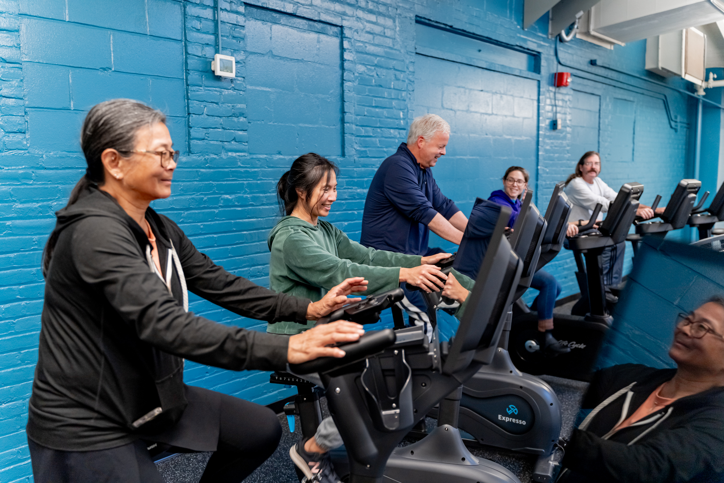 Group of Summit YMCA Members on exercise bikes