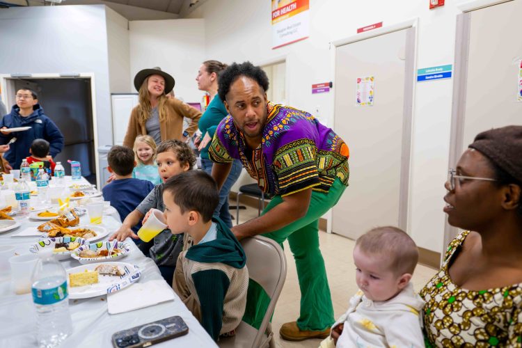Marcus and his son Ezekial at International Night