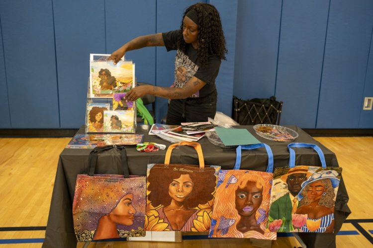 woman selling tote bage