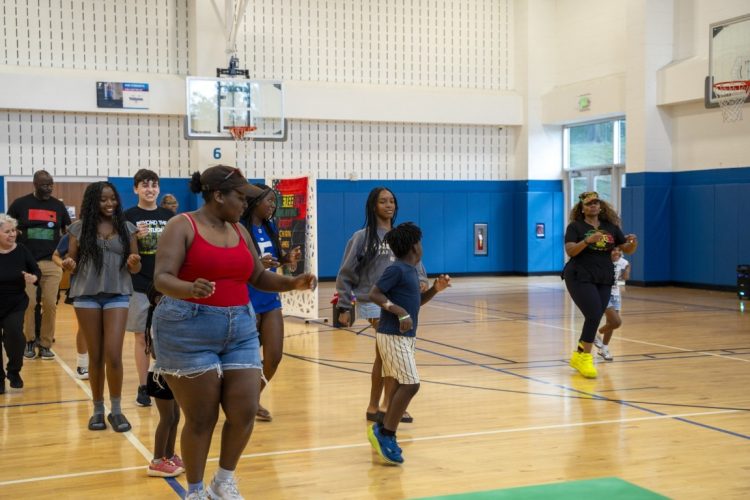 group of people doing zumba