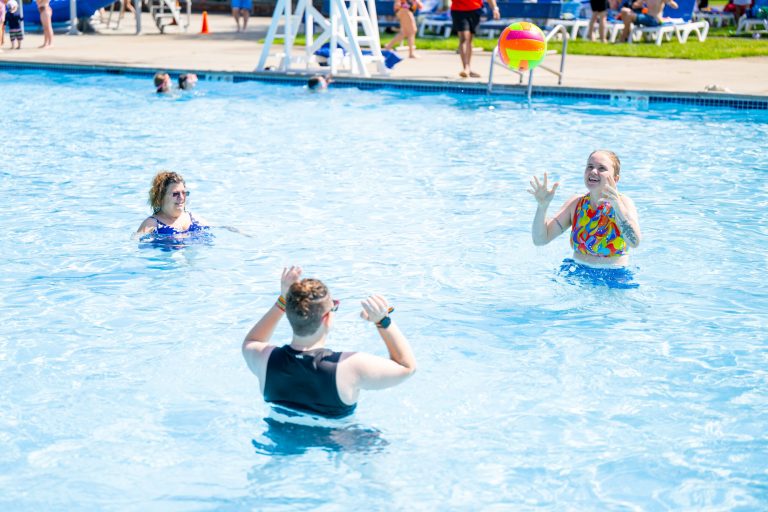 Ground of adults in Springfield Community Pool