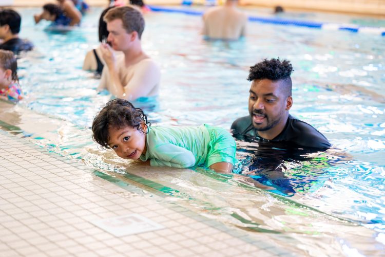 CHILD TAKING A SWIM LESSON AT SUMMIT AREA YMCA